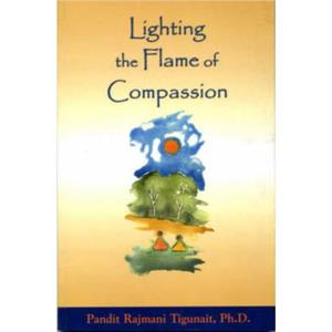 Lighting Flame of Compassion by Translated by Pandit Rajmani Tigunait